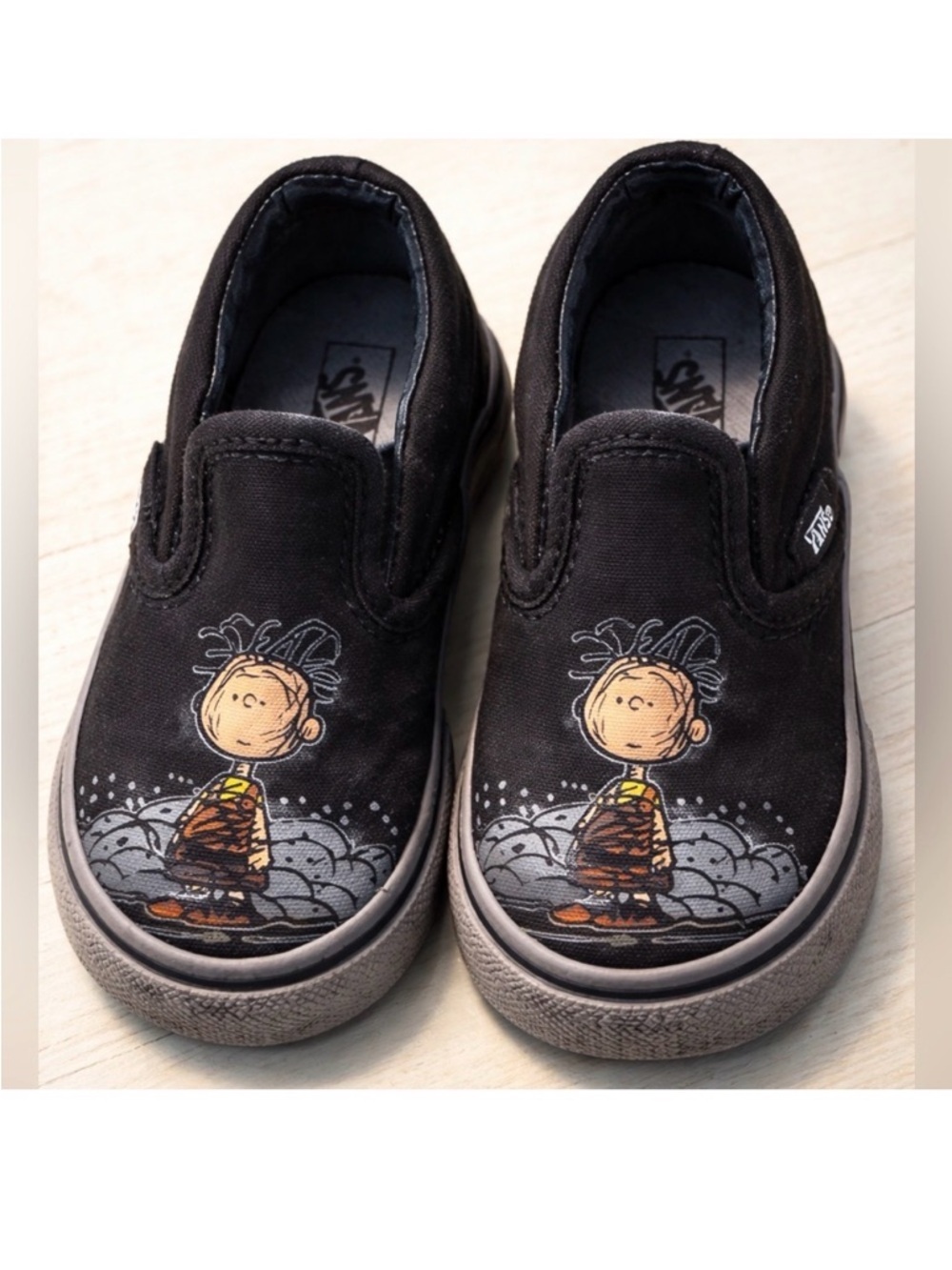 Vans Kids Black Slip-On Sneakers with Cartoon Character